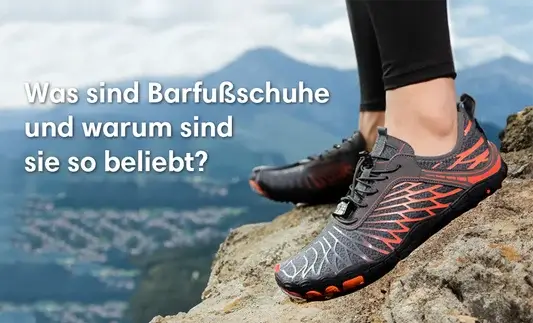Eine Frau mit Rose Vanea Barfußschuhen von Vanea Barfußschuhe, die sich auf einer Klippe des Berges aufhält